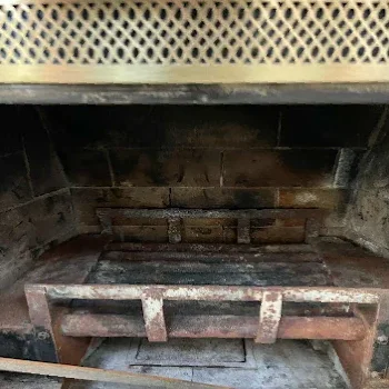 Spotless fireplace interior before cleaning during an inspection in Everett, WA.
